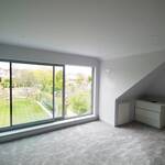 fantastic view and natural light from the sliding full height windows.  